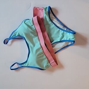 NWOT swimsuit with removable pads and adjustable straps.